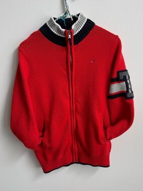 Tommy Hilfiger zip up knot sweater 
Fits as a small IMO